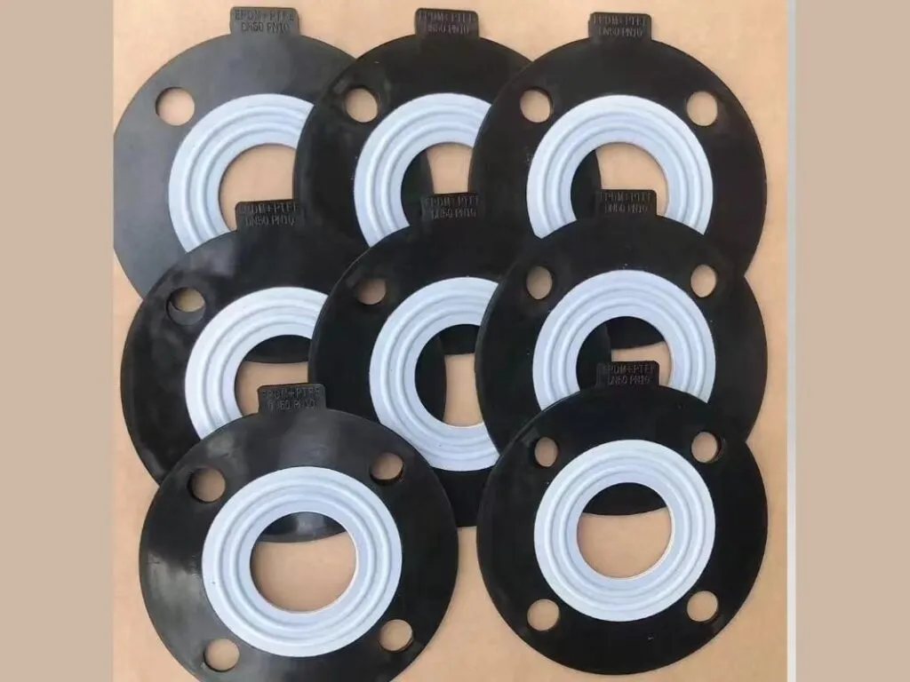 Gioăng bọc ptfe lõi epdm: tám gioăng vành PTFE trắng trên cao su đen