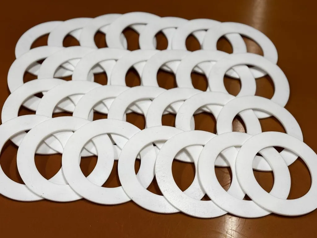 Gioăng làm kín PTFE màu trắng cắt sẵn hình vành khăn, xếp kín mặt bàn
