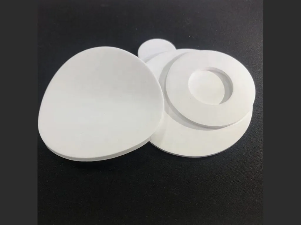 Gioăng ptfe và eptfe: đĩa và vòng ePTFE xốp trắng đặt chồng