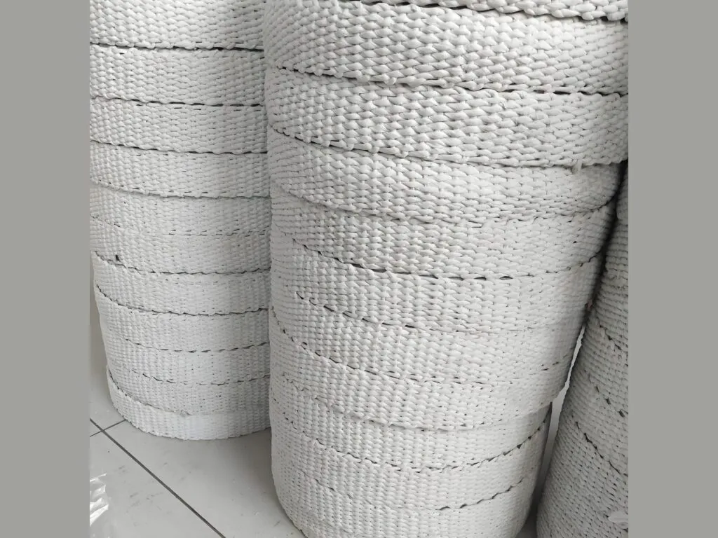 Gioăng sợi thủy tinh trắng dạng băng bện quấn nhiều cuộn